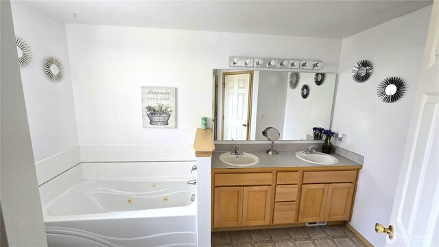 8422 NE 176th St, Arlington, WA 98223 - bathroom featuring a jetted tub and double vanity