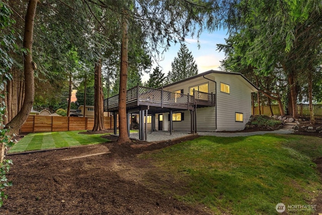 638 SW 299th Pl, Federal Way, WA 98023 - back of property with a fenced backyard and a deck