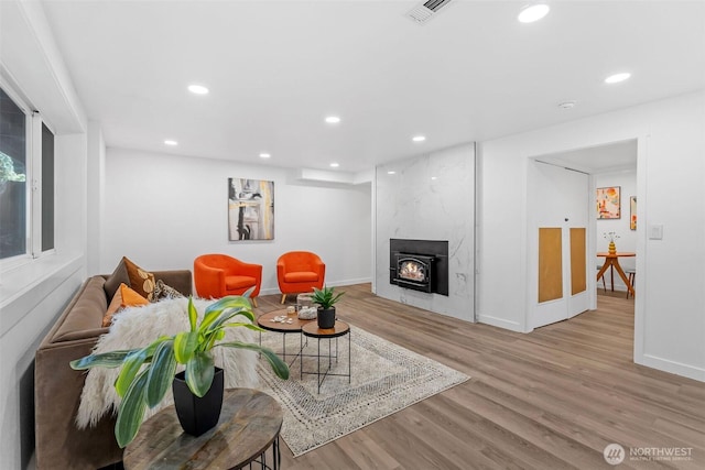 638 SW 299th Pl, Federal Way, WA 98023 - living area with wood finished floors, recessed lighting, and a high end fireplace