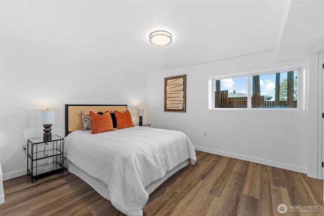 638 SW 299th Pl, Federal Way, WA 98023 - bedroom featuring baseboards and wood finished floors