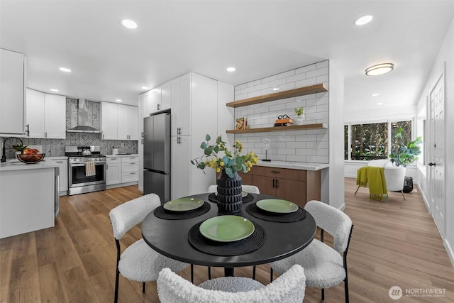 638 SW 299th Pl, Federal Way, WA 98023 - dining room featuring recessed lighting and light wood finished floors