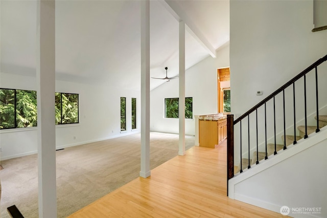 726 114th St NE, Tulalip, WA 98271 - unfurnished living room with healthy amount of natural light, stairway, and light wood-style floors