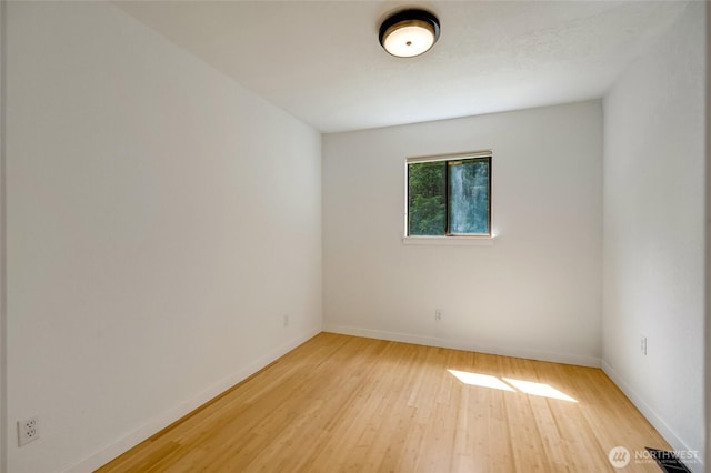 726 114th St NE, Tulalip, WA 98271 - spare room with light wood-style flooring and baseboards
