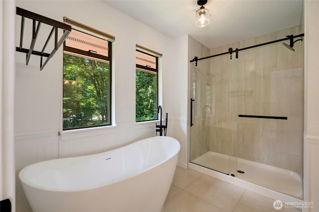 726 114th St NE, Tulalip, WA 98271 - full bath with a shower stall, tile patterned flooring, a freestanding bath, and wainscoting