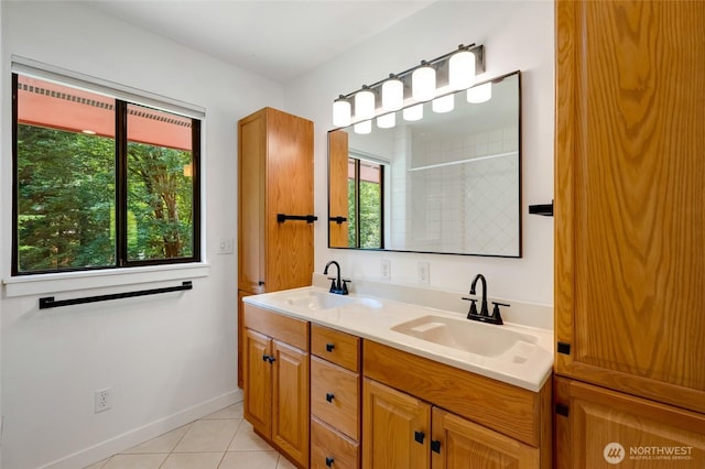 726 114th St NE, Tulalip, WA 98271 - full bathroom featuring double vanity, tile patterned flooring, and tiled shower