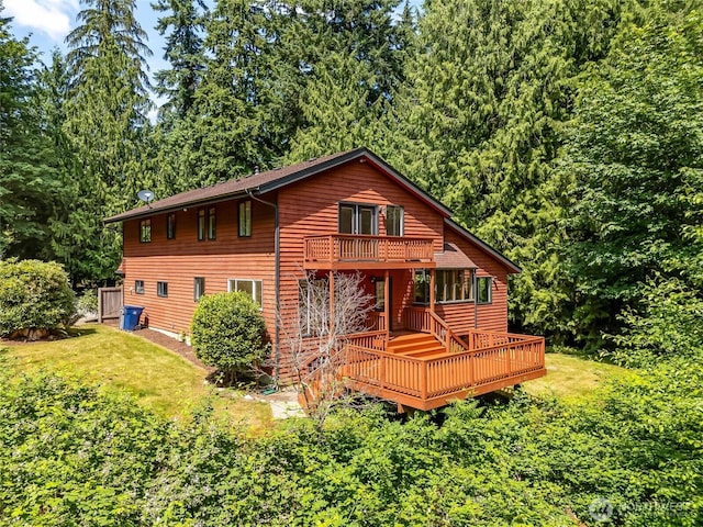 726 114th St NE, Tulalip, WA 98271 - rear view of house with a lawn and a wooden deck