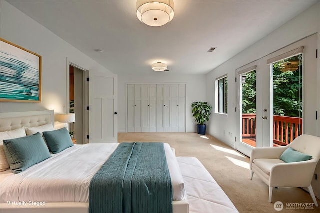 726 114th St NE, Tulalip, WA 98271 - bedroom with access to outside and carpet