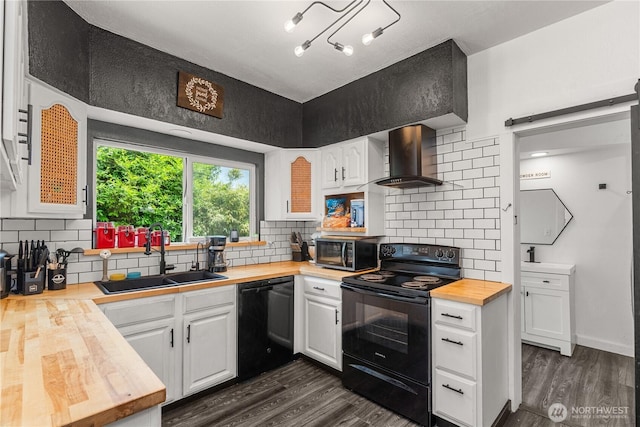 908 N Jeffries St, Aberdeen, WA 98520 - kitchen featuring wooden counters, black appliances, dark wood finished floors, white cabinets, and backsplash