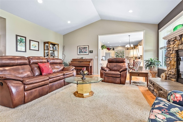 1521 Westview Pl, Lynden, WA 98264 - living area featuring vaulted ceiling, a fireplace, plenty of natural light, light wood finished floors, and recessed lighting