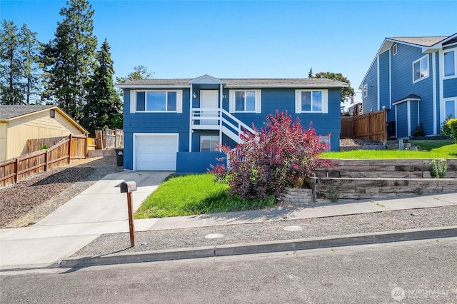 907 S Balsam St, Moses Lake, WA 98837 - view of front of property featuring a garage and driveway