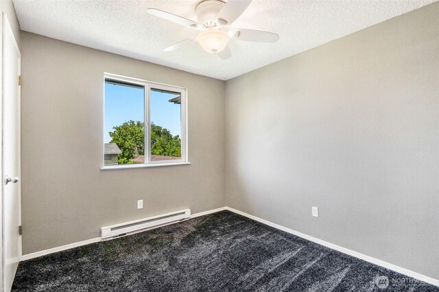 907 S Balsam St, Moses Lake, WA 98837 - carpeted spare room featuring a baseboard radiator, ceiling fan, a textured ceiling, and baseboards