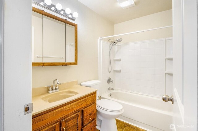 907 S Balsam St, Moses Lake, WA 98837 - bathroom featuring vanity, toilet, and washtub / shower combination