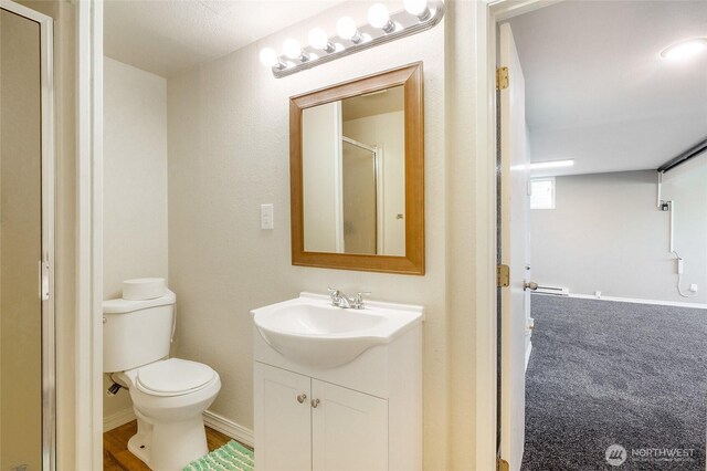 907 S Balsam St, Moses Lake, WA 98837 - full bath with vanity, a shower stall, and toilet