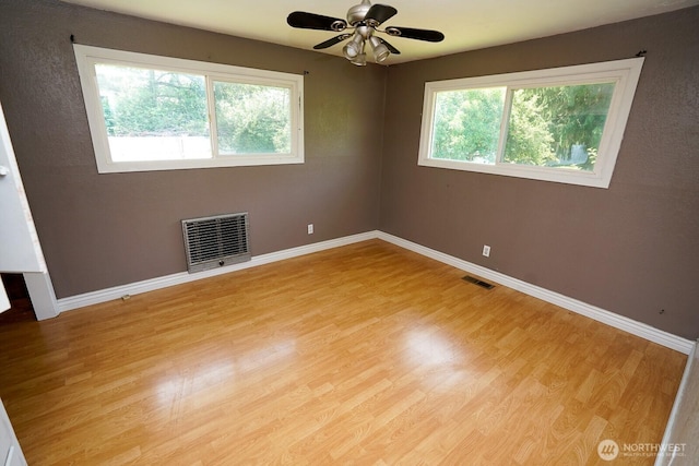 1245 W Axton Rd, Ferndale, WA 98248 - spare room featuring light wood finished floors, baseboards, and ceiling fan