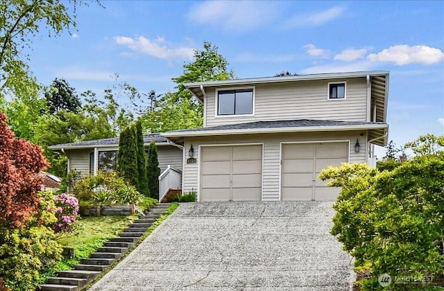 8929 48th Pl W, Mukilteo, WA 98275 - view of front of house featuring stairway, a garage, and gravel driveway
