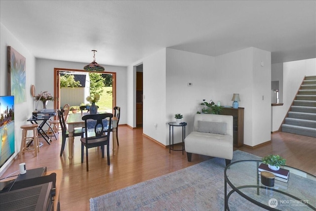 8929 48th Pl W, Mukilteo, WA 98275 - dining room featuring wood finished floors, stairway, and baseboards