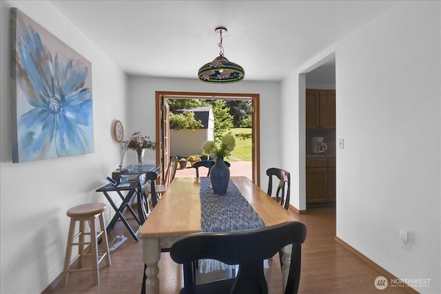 8929 48th Pl W, Mukilteo, WA 98275 - dining space with dark wood-style floors and baseboards