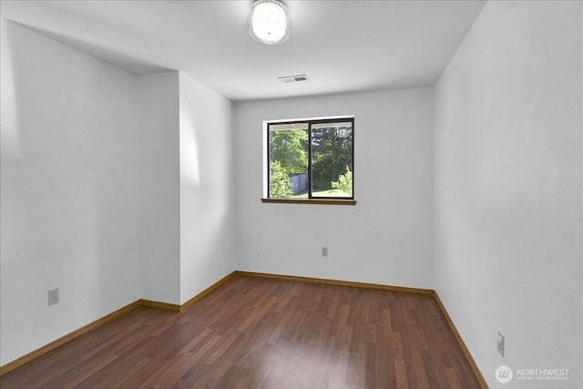 8929 48th Pl W, Mukilteo, WA 98275 - unfurnished room featuring wood finished floors and baseboards
