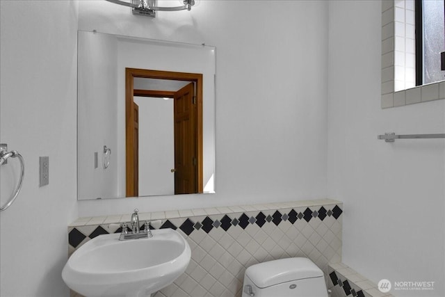 8929 48th Pl W, Mukilteo, WA 98275 - bathroom with a sink, toilet, and tile walls
