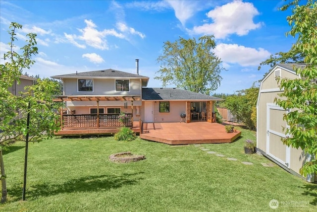 8929 48th Pl W, Mukilteo, WA 98275 - back of property featuring a deck and an outdoor fire pit
