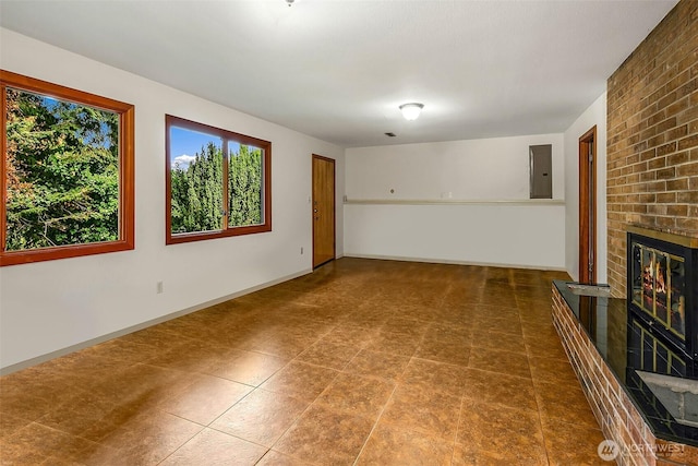 718 N 59th St, Seattle, WA 98103 - unfurnished living room with a fireplace and electric panel