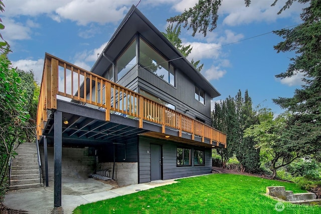 718 N 59th St, Seattle, WA 98103 - rear view of property with a lawn, a deck, a patio, and stairs