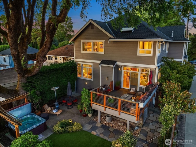 5613 21st Ave SW, Seattle, WA 98106 - rear view of property featuring a hot tub, roof with shingles, a deck, and a patio area
