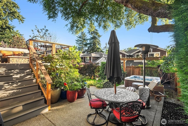 5613 21st Ave SW, Seattle, WA 98106 - view of patio / terrace with a hot tub and stairway