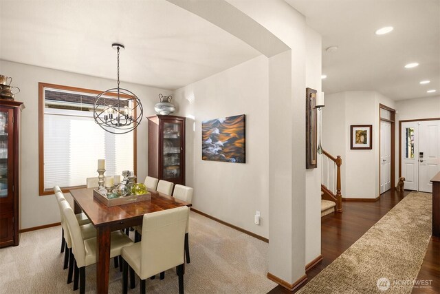 5613 21st Ave SW, Seattle, WA 98106 - dining room featuring a chandelier, stairway, recessed lighting, and arched walkways