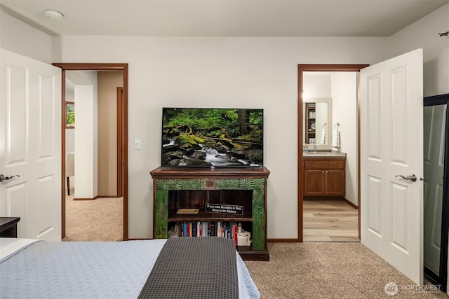 5613 21st Ave SW, Seattle, WA 98106 - bedroom with light carpet and ensuite bathroom