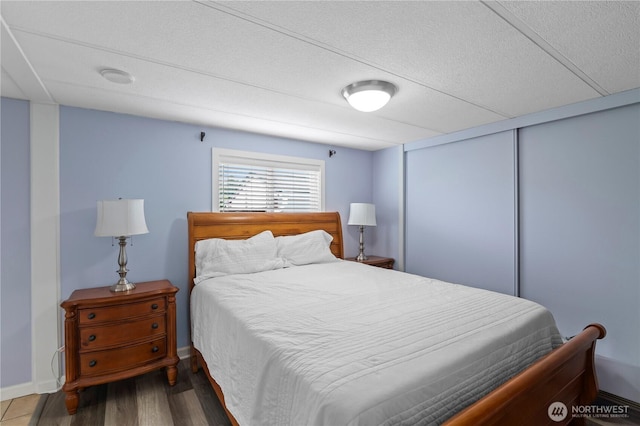 1427 100th St SW Unit 145, Everett, WA 98204 - bedroom featuring wood finished floors and a closet