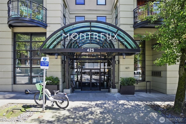425 Vine St Unit 513, Seattle, WA 98121 - doorway to property featuring a balcony and a gate