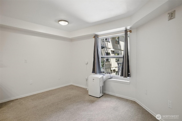 425 Vine St Unit 513, Seattle, WA 98121 - carpeted spare room featuring baseboards