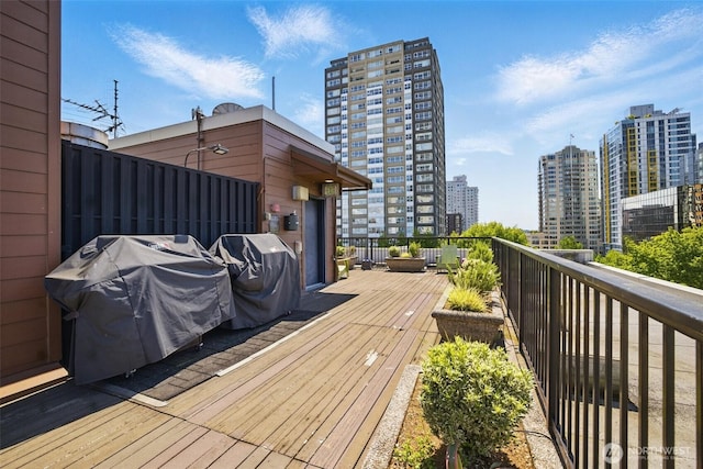 425 Vine St Unit 513, Seattle, WA 98121 - wooden deck with a view of city
