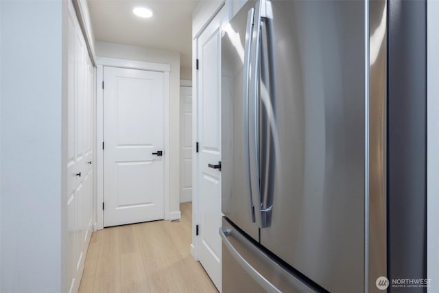 11215 NE 128th St Unit L-203, Kirkland, WA 98034 - corridor featuring light wood-style flooring and recessed lighting