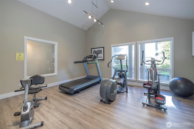 11215 NE 128th St Unit L-203, Kirkland, WA 98034 - exercise area featuring wood finished floors, high vaulted ceiling, recessed lighting, and baseboards
