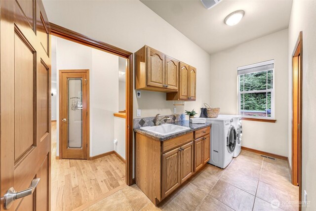 8 Southern Ct, Bellingham, WA 98229 - washroom featuring washer and dryer and cabinet space