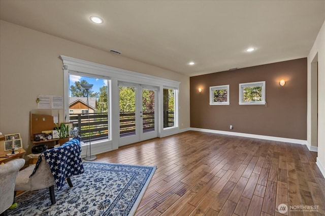 2025 NE 37th Pl, Renton, WA 98056 - living area featuring wood finished floors and recessed lighting