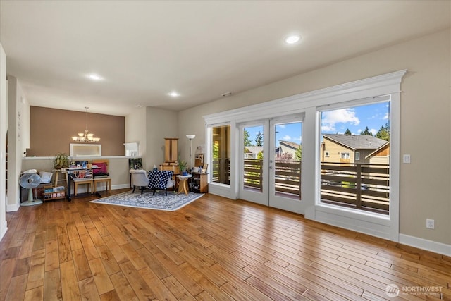 2025 NE 37th Pl, Renton, WA 98056 - sitting room featuring a chandelier, wood finished floors, recessed lighting, and french doors