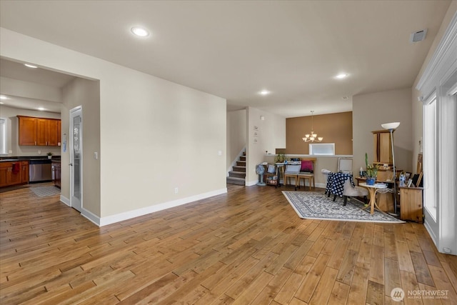 2025 NE 37th Pl, Renton, WA 98056 - living area featuring stairs, a chandelier, light wood finished floors, and recessed lighting