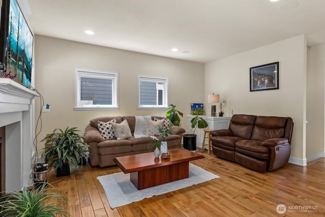 2025 NE 37th Pl, Renton, WA 98056 - living area with light wood finished floors, recessed lighting, and a fireplace