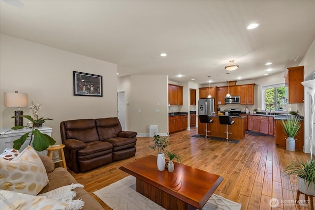 2025 NE 37th Pl, Renton, WA 98056 - living area with light wood-style floors and recessed lighting