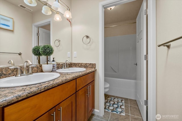 2025 NE 37th Pl, Renton, WA 98056 - bathroom featuring double vanity, tile patterned floors, and shower / washtub combination