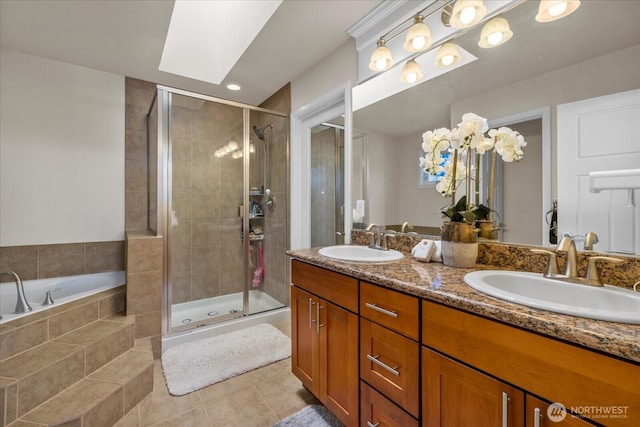 2025 NE 37th Pl, Renton, WA 98056 - full bath with tile patterned flooring, double vanity, a shower stall, and a bath