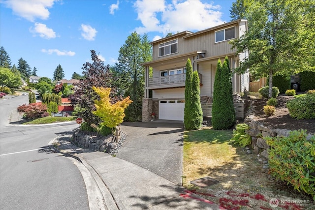 2025 NE 37th Pl, Renton, WA 98056 - view of front of house with driveway and an attached garage