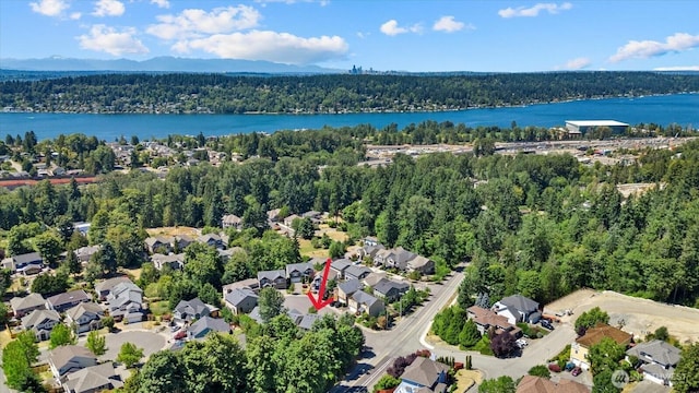 2025 NE 37th Pl, Renton, WA 98056 - aerial perspective of suburban area featuring a heavily wooded area and a large body of water