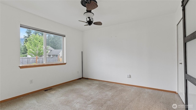 215 19th St, Gold Bar, WA 98251 - unfurnished room with light colored carpet, ceiling fan, and baseboards