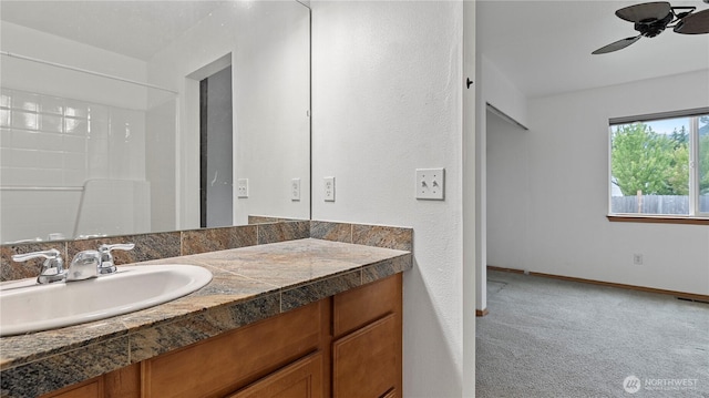 215 19th St, Gold Bar, WA 98251 - bathroom with vanity, a ceiling fan, and baseboards