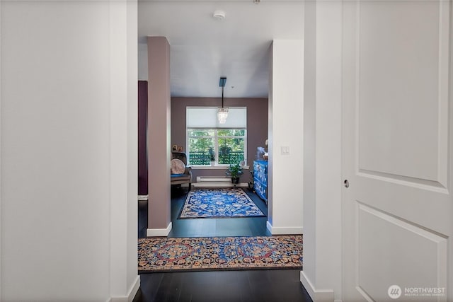 55 Williams Ave S Unit 209, Renton, WA 98057 - corridor with baseboards and wood finished floors