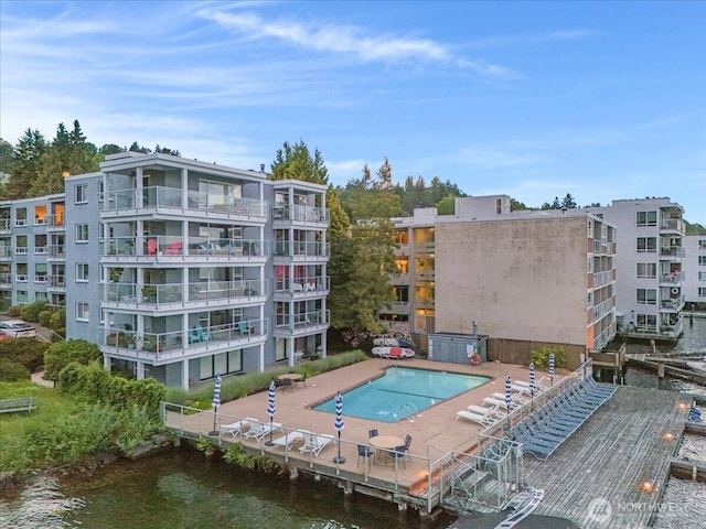 720 Lakeside Ave S Unit 406, Seattle, WA 98144 - view of apartment building / complex with a community pool and a water view